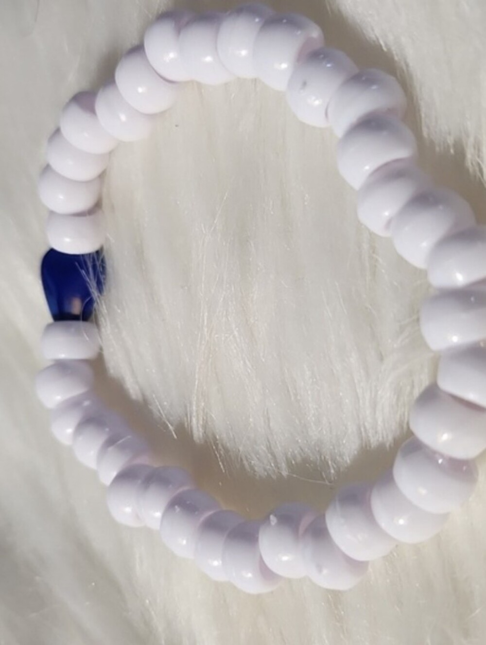 White Beaded Stretch Bracelet with Blue Accent